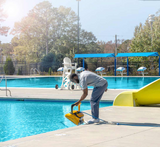 Maytronics Dolphin Wave 60 yellow robotic pool cleaner, top view