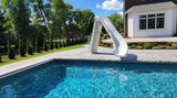 Bad Axe X7 pool slide at a residential swimming pool, lifestyle view 1
