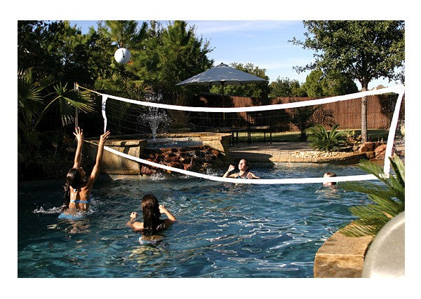 S.R. Smith VOLY1 Swim 'N Spike volleyball set installed across an inground pool
