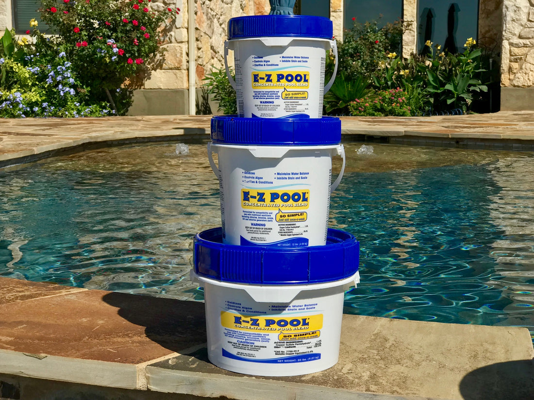 E-Z Pool 5, 10 and 20 lb pails stacked beside a pool