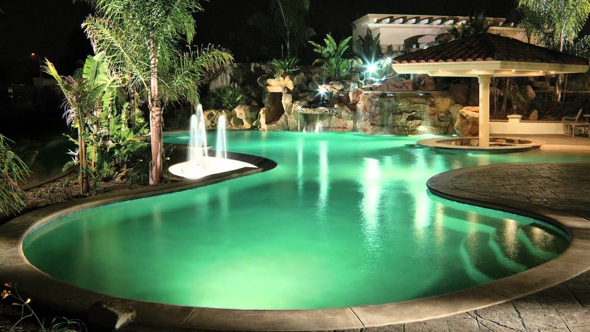 Pentair MicroBrite Color EC-620425 LED light installed and lit in a pool