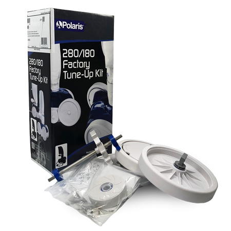 Polaris A49 tune up kit parts laid out: wheels, tires, axles, bearings and drive shaft